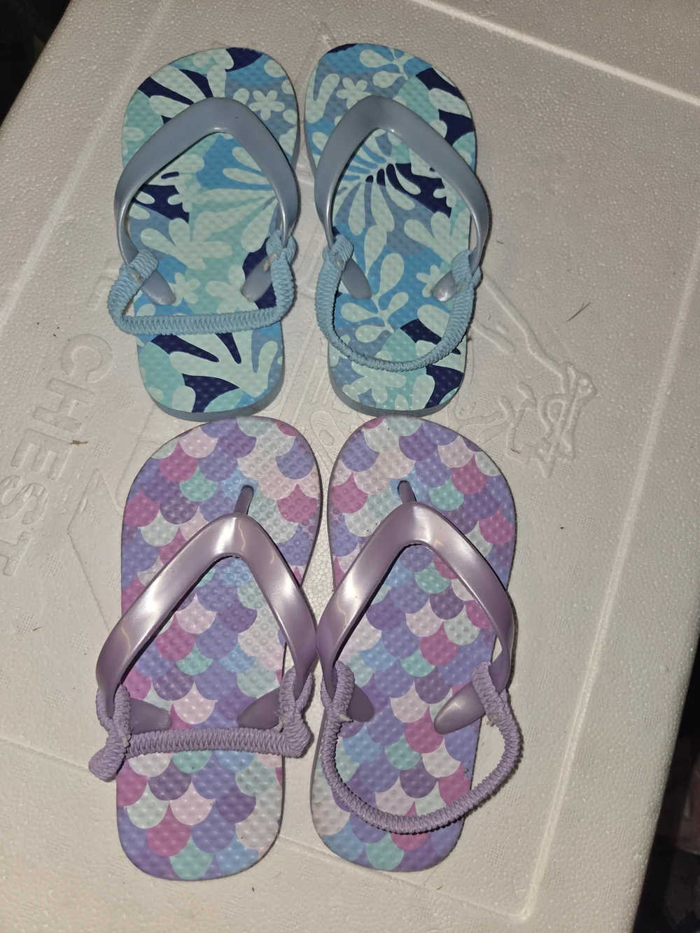 2 Sets Of Kids Flip Flops - Light Blue & Lavender Patterned Sandals